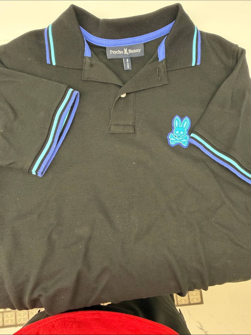Psycho Bunny Black Polo with Blue & Teal Trim